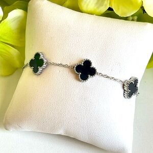 Elegant Silver and Black Clover Bracelet